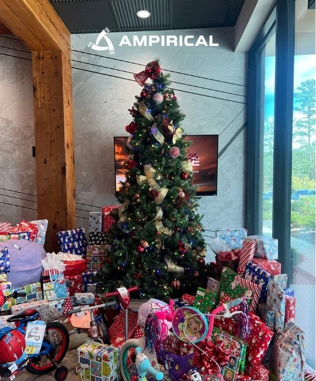 Christmas tree with gifts from Ampirical donations