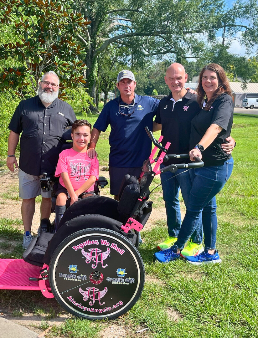 Group of people with disabled child granted special bike for races